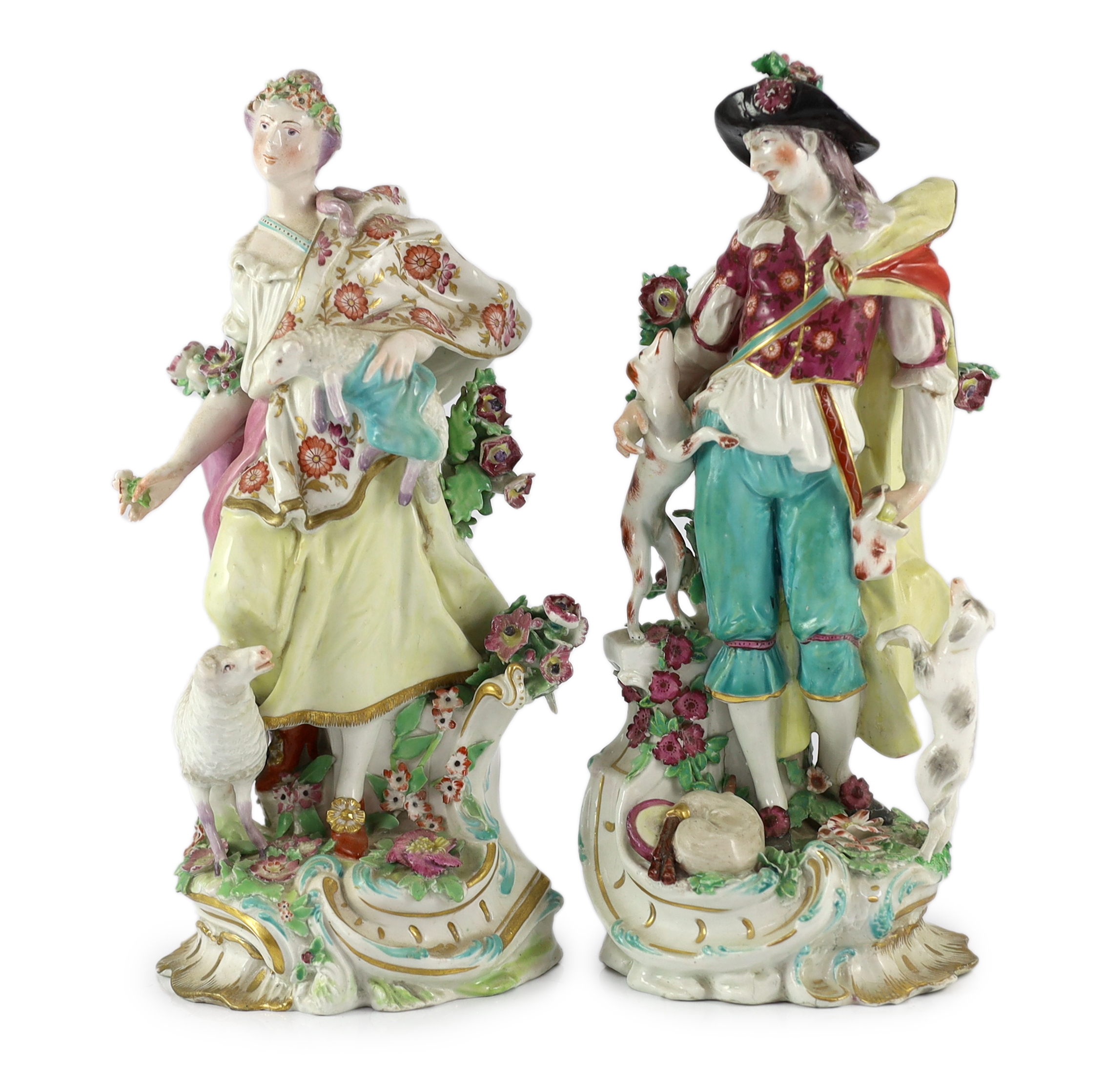 NB shepherdess head restored. A pair of Chelsea porcelain groups of a shepherd and shepherdess , c.1760-65